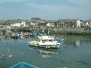 Boats in Porthleven inner harbour. 30 May 2003.